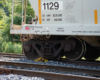 Rear of covered hopper next to wheel ramp