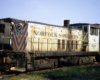 Oddball diesel locomotives: white locomotive with red stripes on front