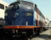 blue locomotive with orange stripe 