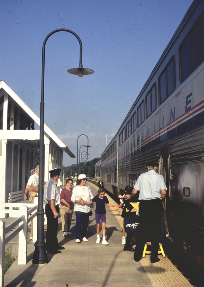 People boarding passenger train