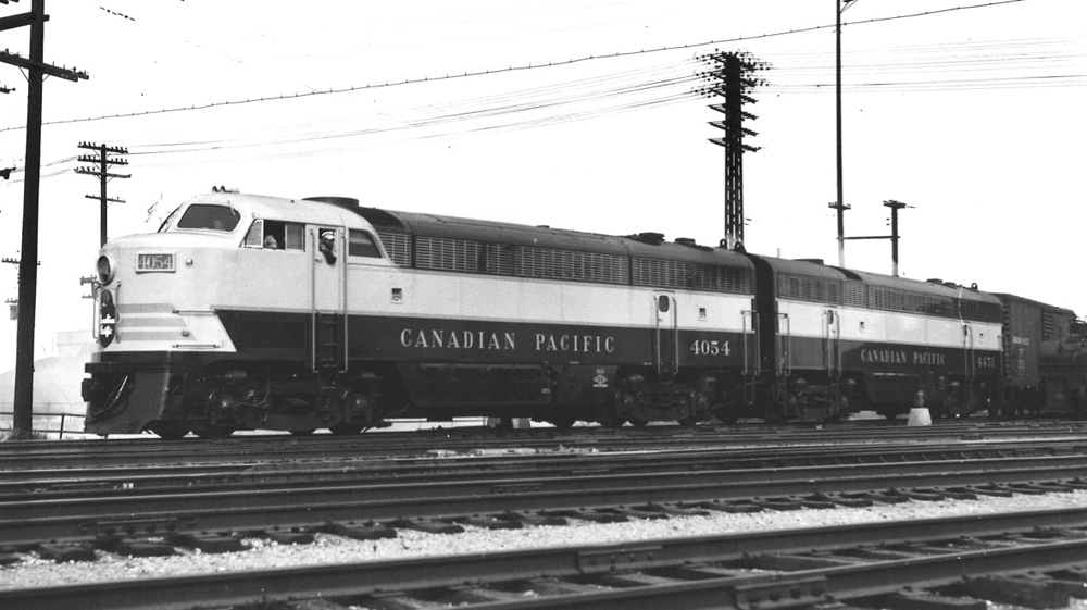 Black and white photo of cab unit and B unit on freight train