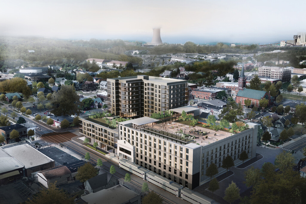 Illustration showing aerial view of project including new train station