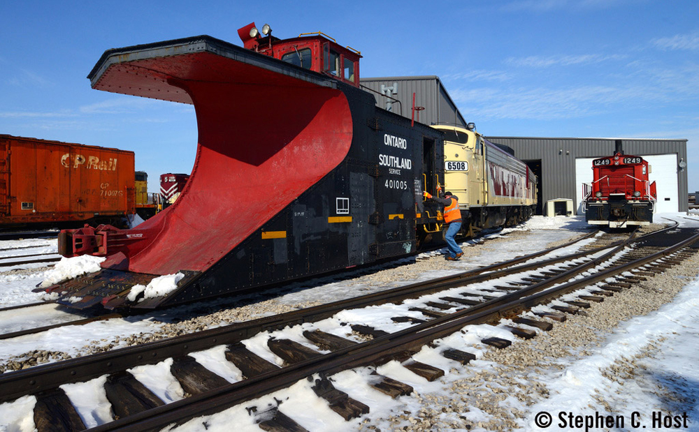 Diesels being attached to snowplow