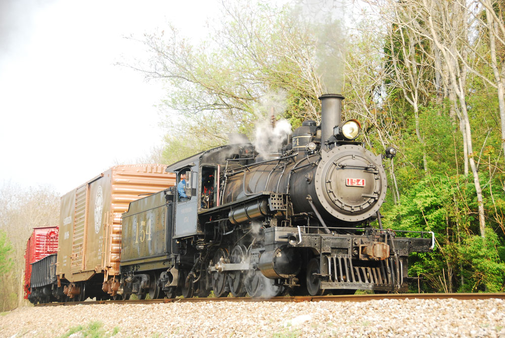 2022 steam locomotive list spring update: photo of black steam locomotive pulling a short freight, Spring 2022 steam locomotive list