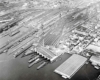 Aerial view of rail yards and piers along waterfront