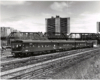 Conrail passenger trains: Inspection car lead by a streamlined locomotive.