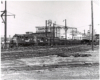 Conrail passenger trains: Two 1960s locomotives at the head of electric MU cars in a rail yard.