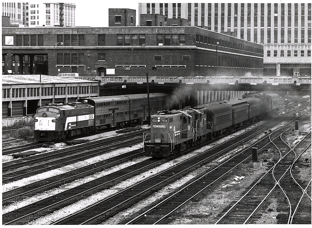 Conrail passenger trains: Conrail and Burlington Northern passenger trains in a Chicago rail yard.