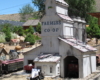 Model grain elevator on a garden railway.