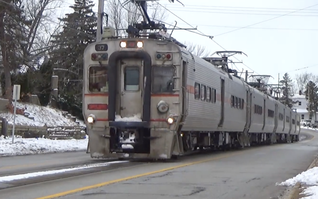 Front view of a street-running train.