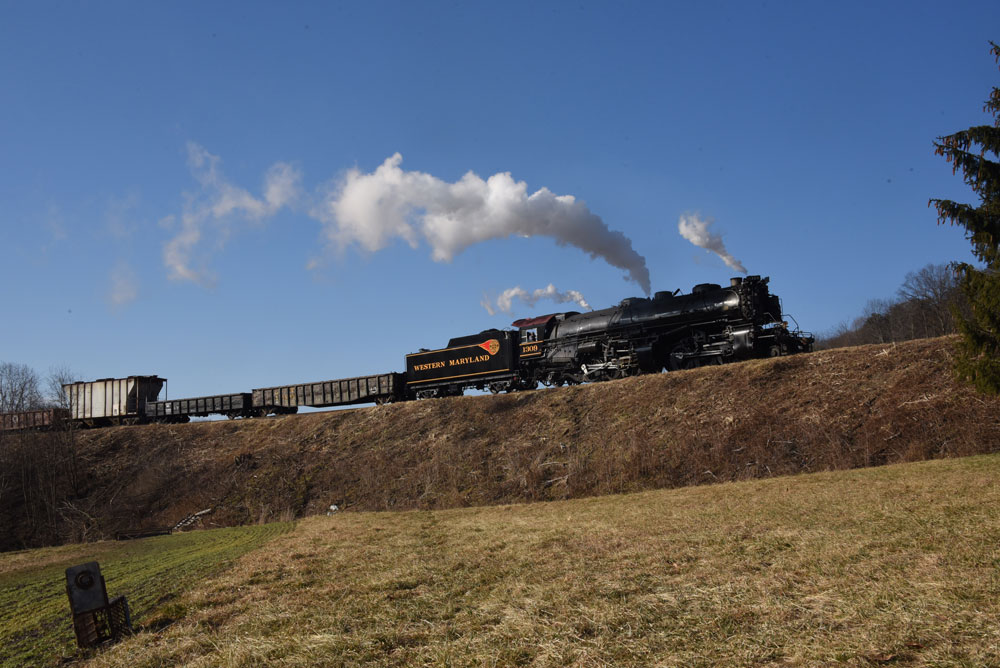 Side view of steam engine and train works upgrade