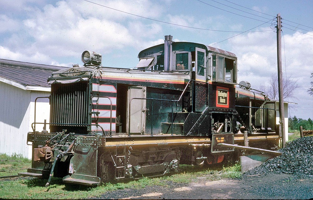 Black and Silver center cab locomotive.
