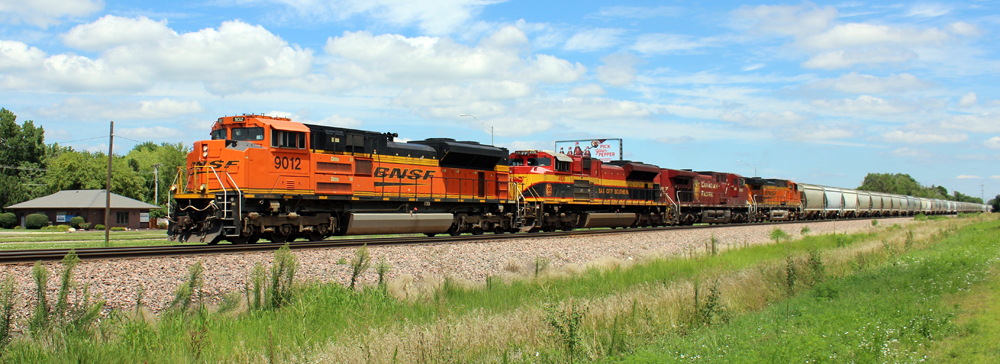Train with four locomotives from three railroads