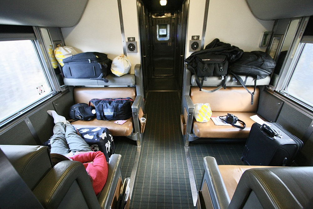 Seats in area cluttered with suitcases
