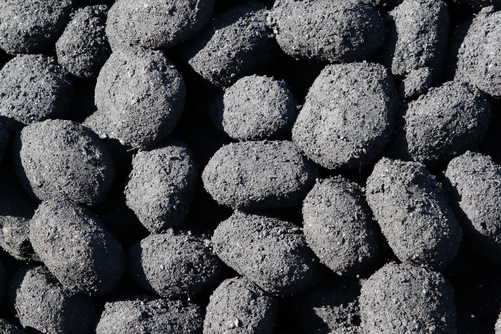 Close-up of lumps of coal-like fuel