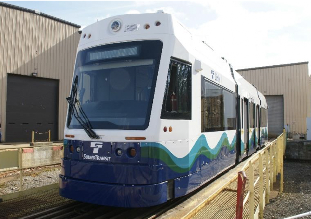 Whiute and blue light rail trainset