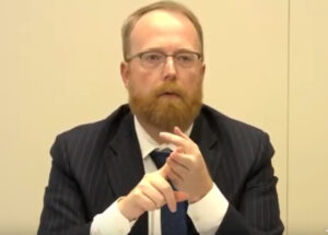 Man in suit in yellow room