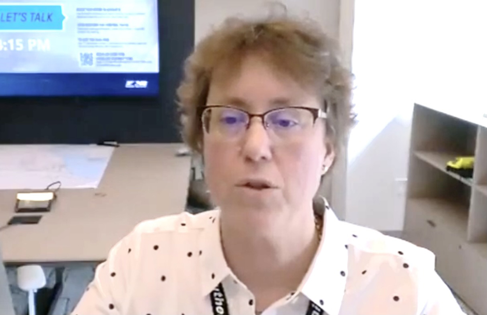 Woman with glasses in office