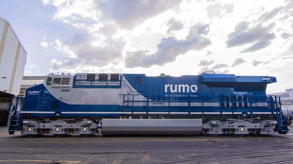 Side view of blue and silver locomotive