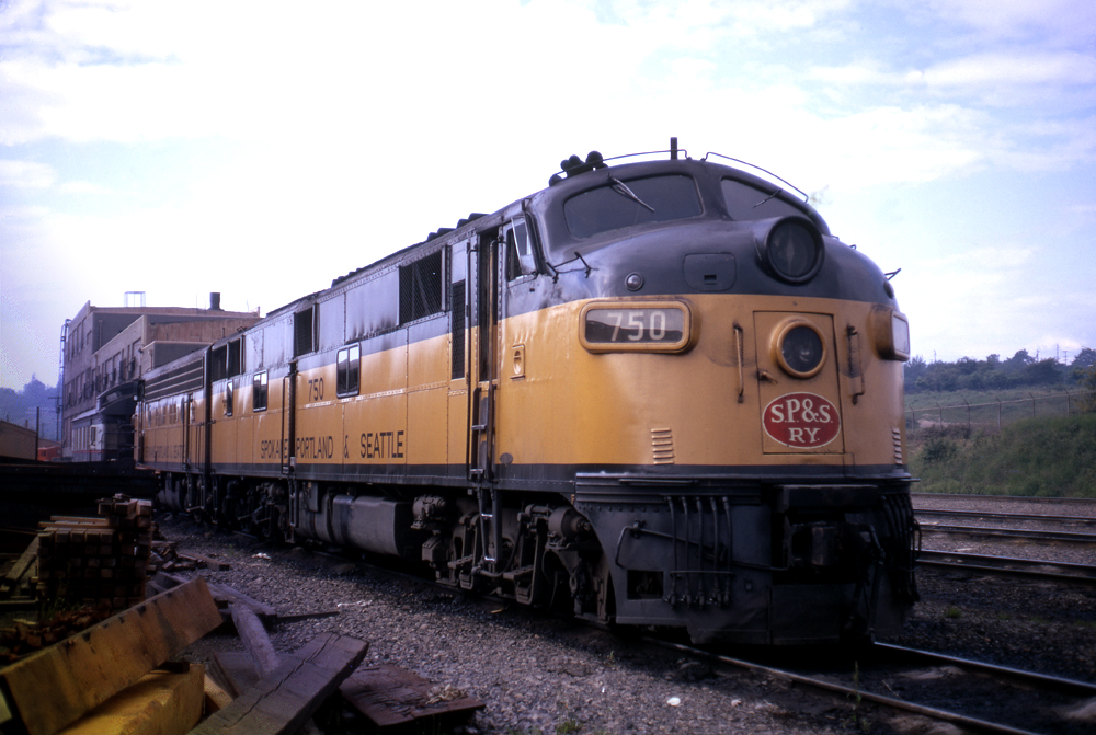 Three-quarter front view of a streamlined diesel locomotive.