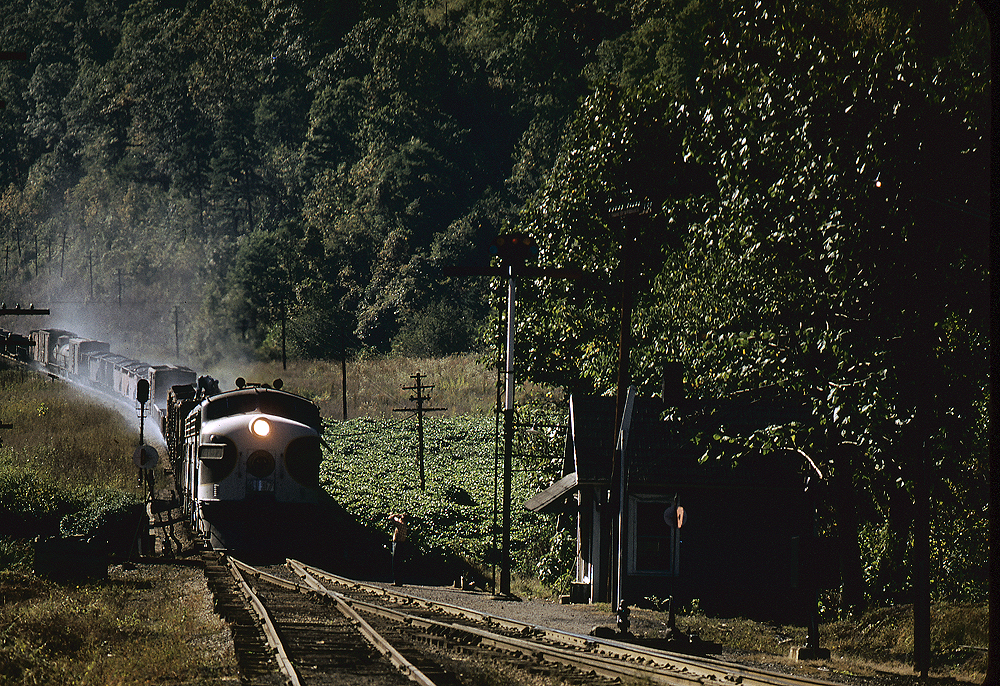 Southern Railway history: A streamlined locomotive with a freight train on a downhill grade.