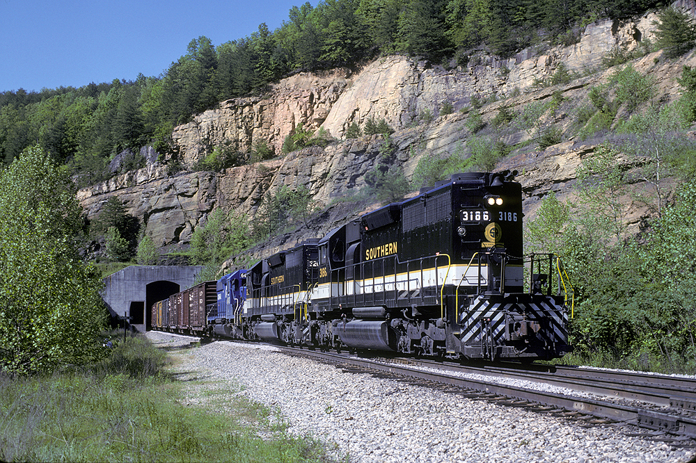 Southern Railway history: Black locomotives pulling a freight train.