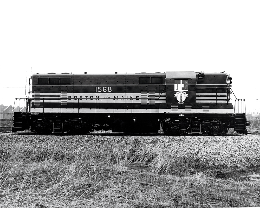 1950s EMD customer relations: A profile view of a four-axle diesel locomotive.