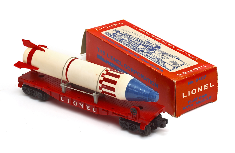Lionel 6407 flatcar with missile and removable Mercury capsule
