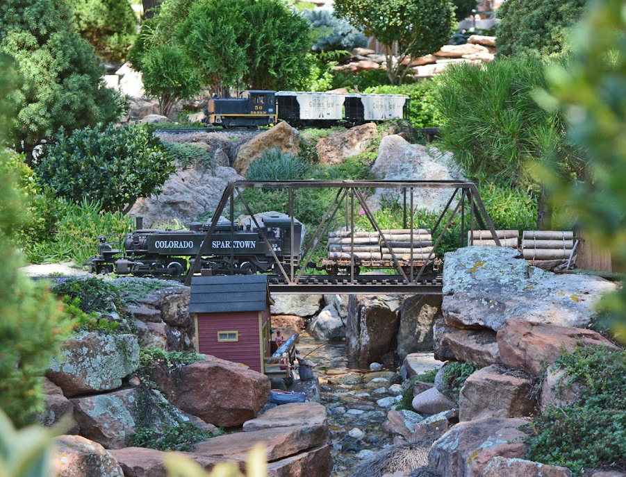 Steam locomotive scene on garden railroad