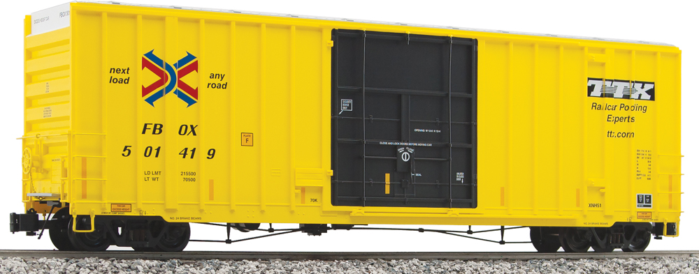 Photo of boxcar painted yellow and black.