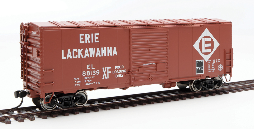 HO scale boxcar painted Boxcar Red with black and white graphics.