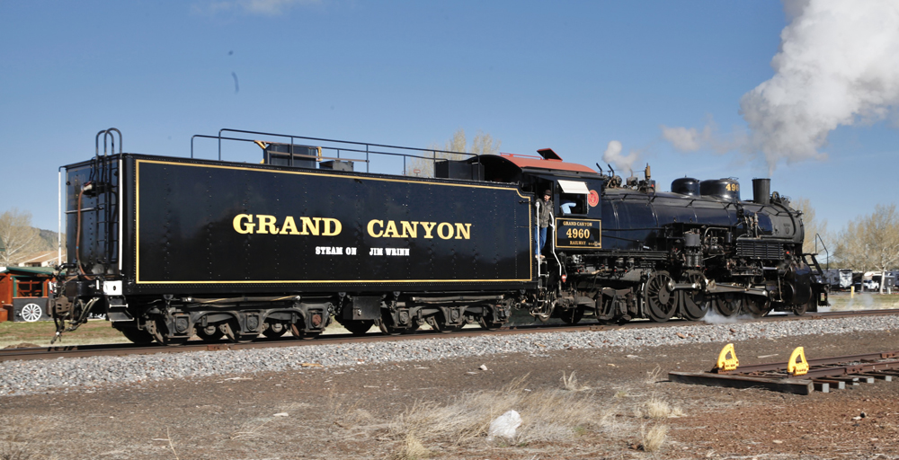 Side view of black steam locomotive