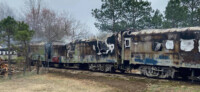 Remains of railcars severely damaged by fire