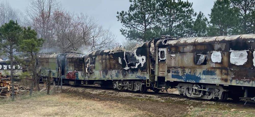 Remains of railcars severely damaged by fire