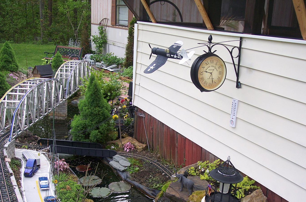 Side of a house with railway next to it