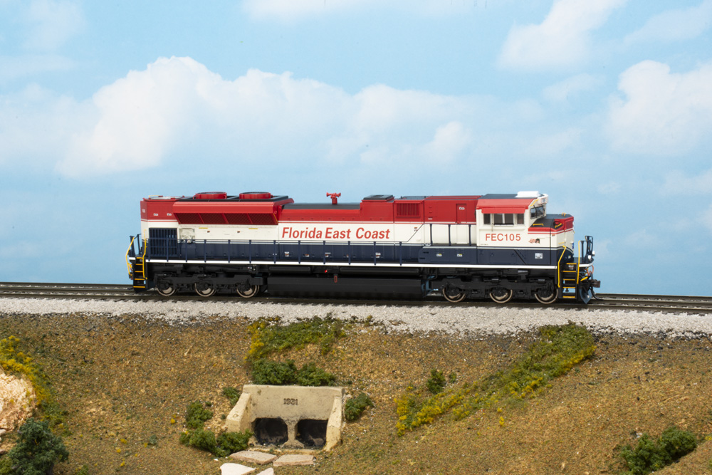 white, red, and blue diesel locomotive