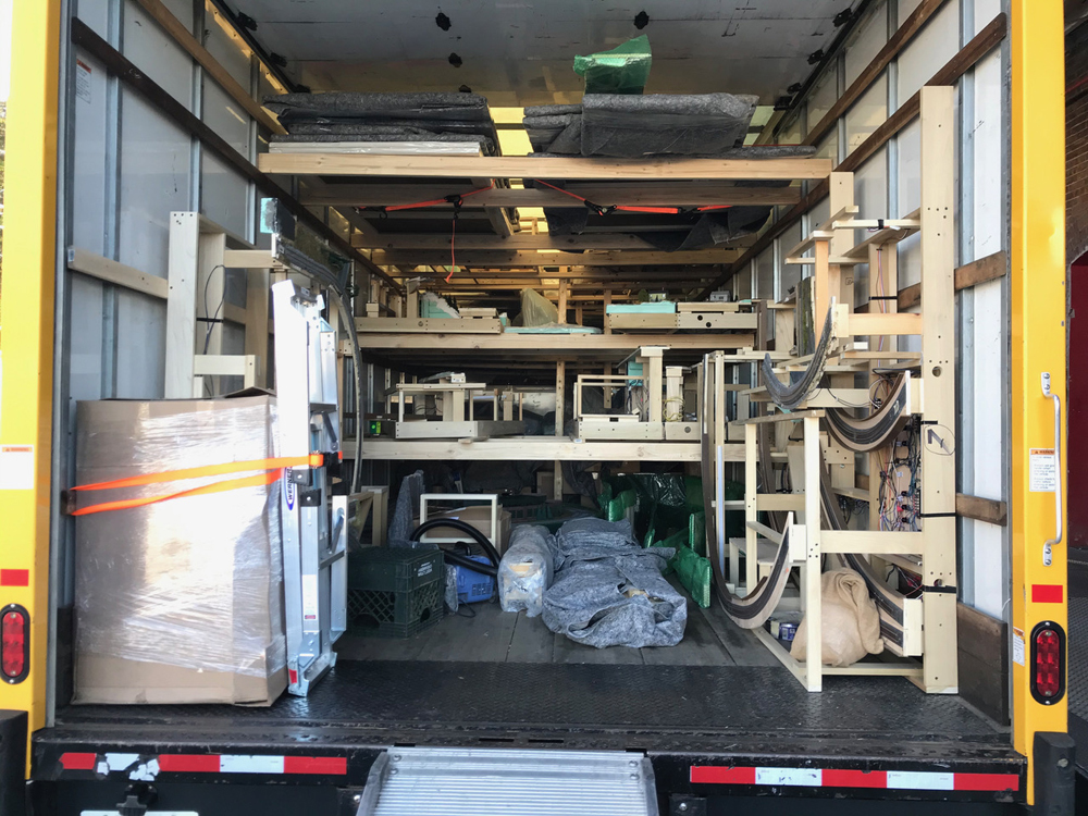 A moving truck packed securely with layout pieces