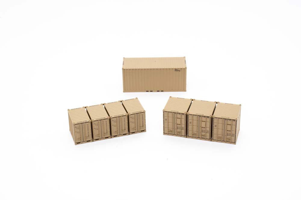 Three Desert Sand colored intermodal containers