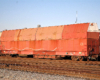 Specialized flat car made to carry an airplane wing.