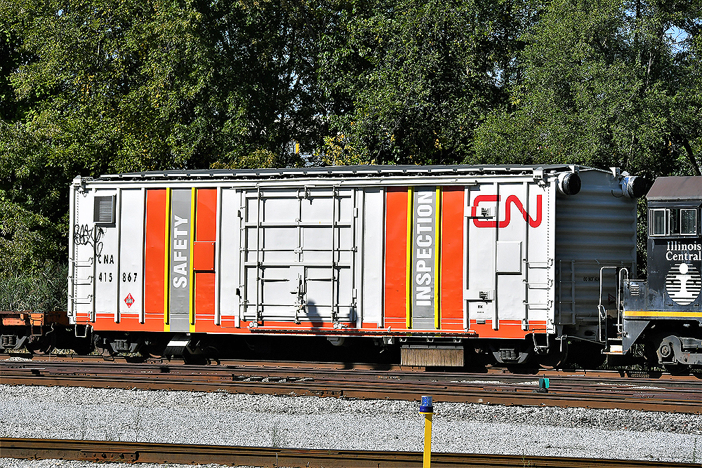 Boxcar equipped with scientific instruments for railroad track inspection.