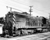 Baldwin locomotive with trolley poles at each end.