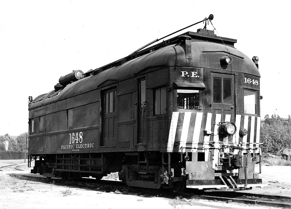 Modified gas-powered doodlebug with trolley pole.