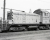 EMD locomotive with two trolley poles.