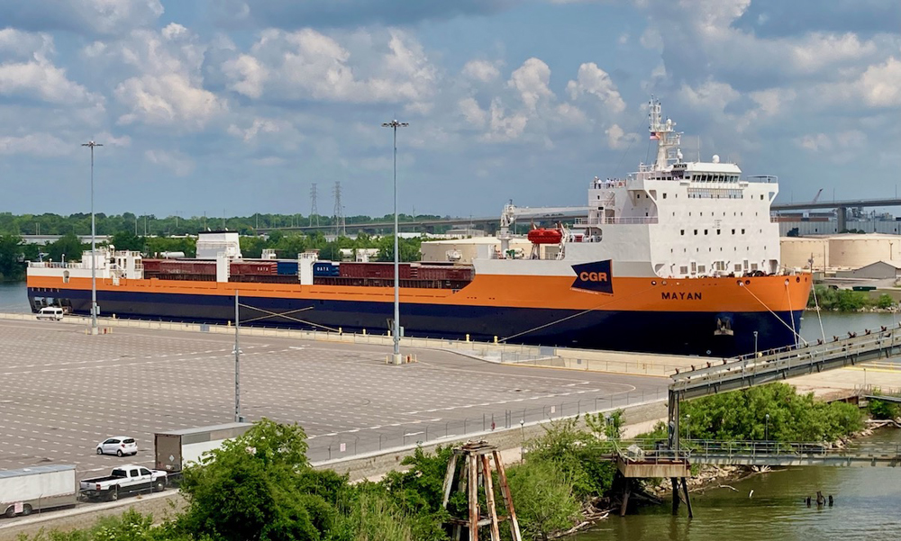 Ship loaded with railcars at dock