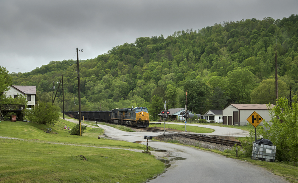 Train in the midst of green hills