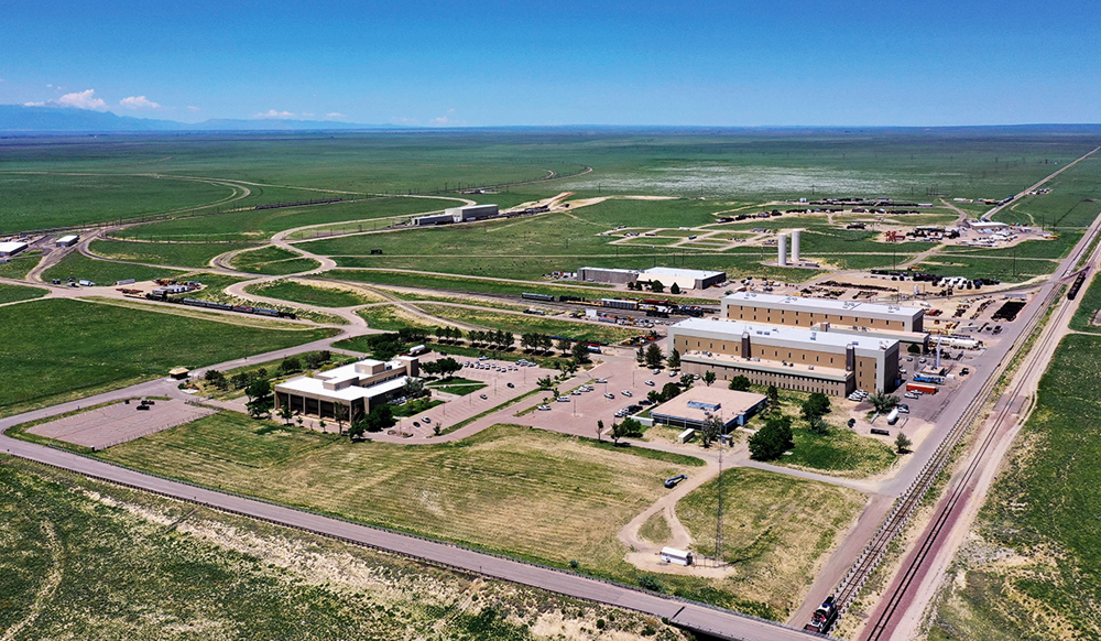 Aerial view of buildings on large open plains area