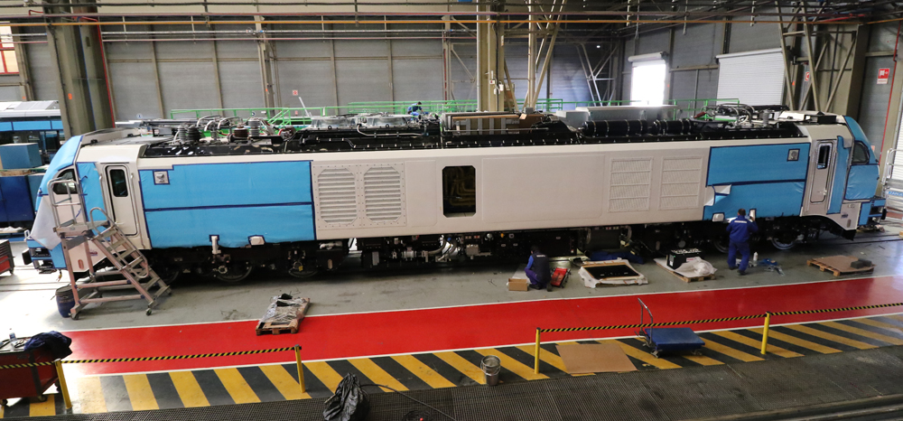 Locomotive under construction in shop building