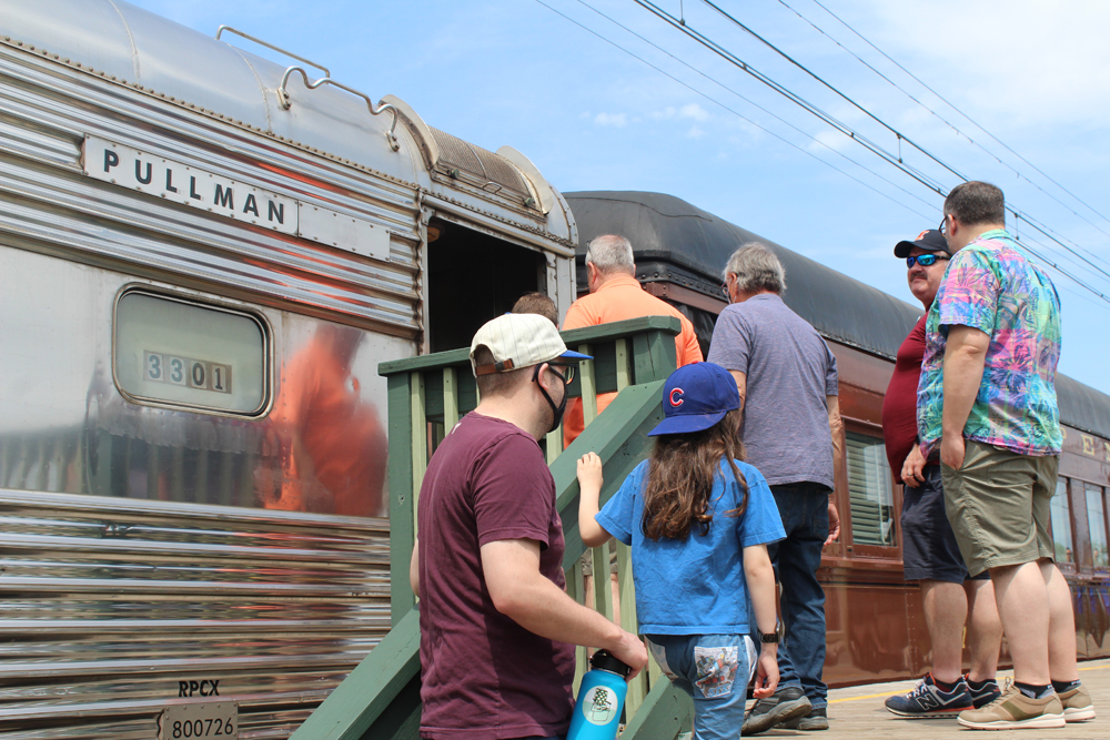 People in line at passenger car door