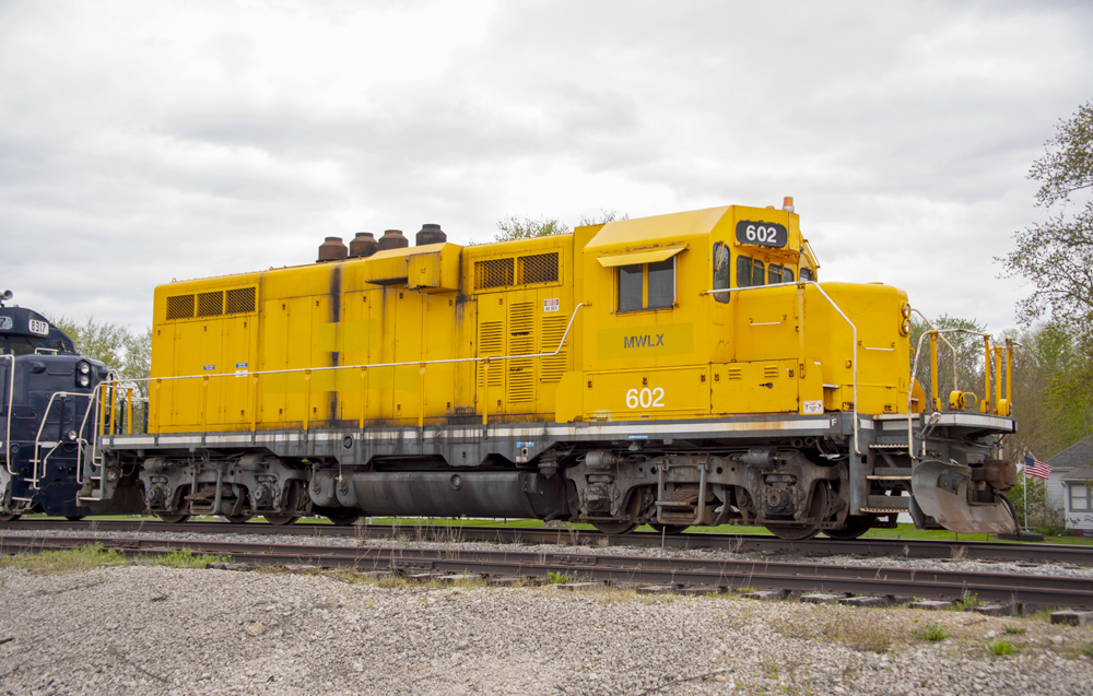 Yellow rebuilt low-nose locomotive