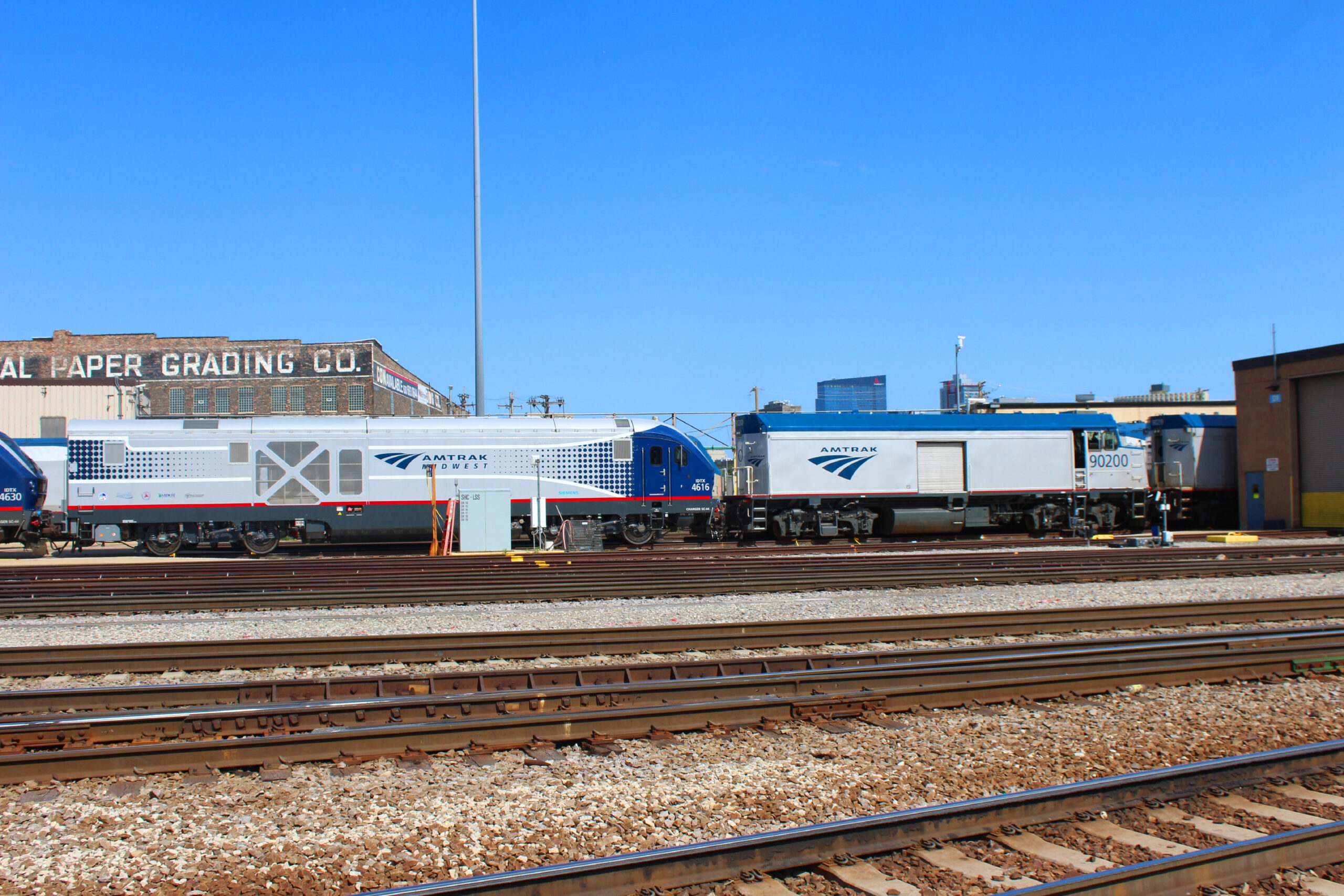 Amtrak charger locomotive coupled to cabbage control car